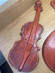 vintage Royal cast metal violin and mandolin set wall hanging, typically found i