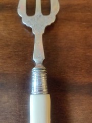 Antique 1913 Edwardian silver collared Trident searing fork