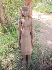 Ancient egyptian antique tall wooden female sculpture with carved hair and dress
