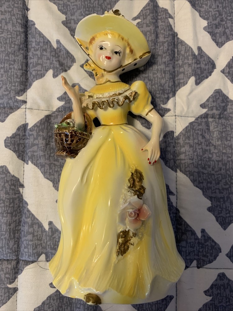 vintage unbranded yellow victorian figurine. made in Japan
