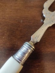 Antique 1913 Edwardian silver collared Trident searing fork