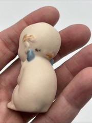 Kewpie Doll with Blue Wings Porcelain Sitting Figurine 2.25″- Unknown Marking
