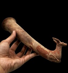 WESTERN ASIATIC TERRACOTTA RHYTON VESSEL.