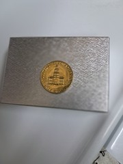 moneda.de 50 centavos de kenedy sin circular protegida con un material plastico