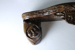 Miniature gothic heads ceramic wall console