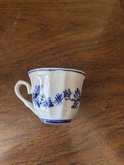 Delft Blue and white demitasse cup and saucer. Hand painted Holland