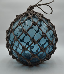 VINTAGE GLASS FISHING FLOAT IN GREY BLUE