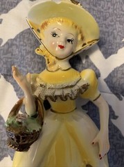 vintage unbranded yellow victorian figurine. made in Japan