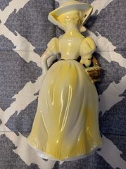 vintage unbranded yellow victorian figurine. made in Japan