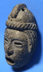 PRE-COLUMBIAN MIXTEC BASALT FACE PENDANT