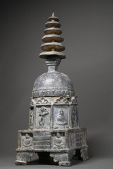 CIRCA NEAR EASTERN GANDHARAN METAL STUPA WITH BUDDHA FIGURES AND SCENES. RARE