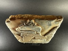 DETAILED ANCIENT N-EASTERN STONE FRAGMENT DEPICTING WINGED GENIE C 800-700 BC