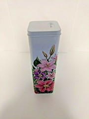 A 9 5/8″ Tall Square Tin with Raised Floral Décor Made in the United Kingdom