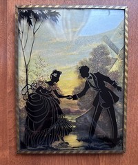 Vintage Silhouette Painted On Convex Glass 6″ x 8″ Couple Crossing Creek 1940s