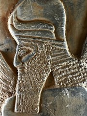 DETAILED ANCIENT N-EASTERN STONE FRAGMENT DEPICTING WINGED GENIE C 800-700 BC