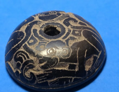 PRE-COLUMBIAN MIXTEC DECORATED CERAMIC SPINDLE WHORL WITH ZOOMORPHIC MOTIF