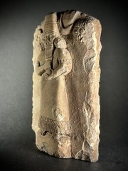 LARGE ASSYYRIAN STONE CARVED PLAQUE DEPICTING MALE RULER UNDER THE SUN AND STARS