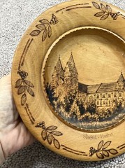 VINTAGE 8.5” PYROGRAPHY WOODEN PLATE-“HUNFELD KIOSTER” FOLK ART