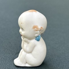 Kewpie Doll with Blue Wings Porcelain Sitting Figurine 2.25″- Unknown Marking