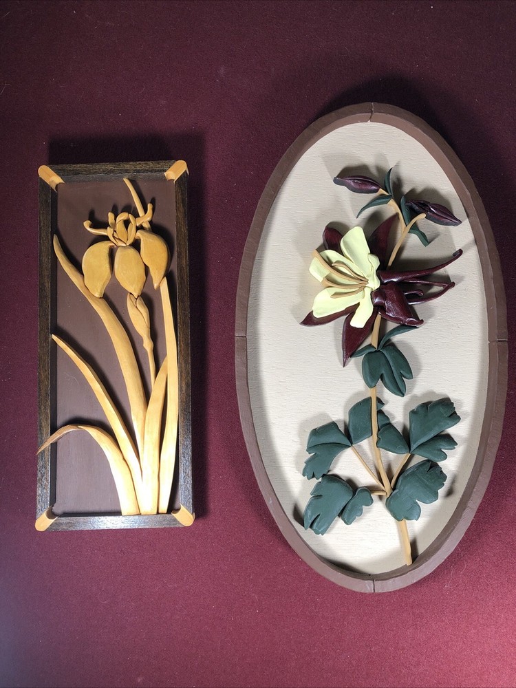 Two Wooden Multi-Toned Bas-Relief Floral Wall Hangings