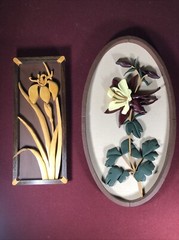 Two Wooden Multi-Toned Bas-Relief Floral Wall Hangings