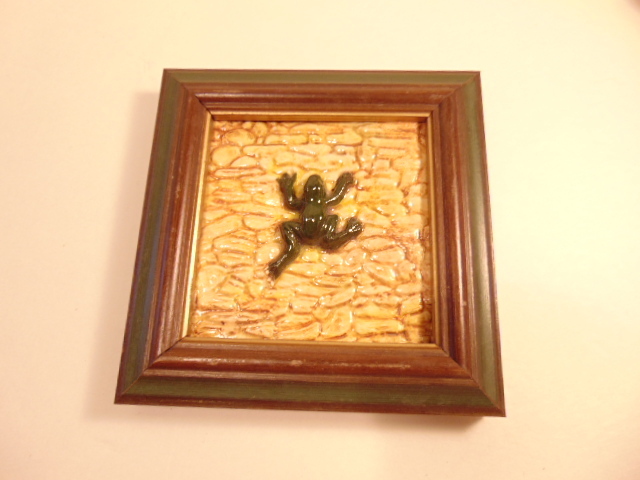 Modern framed decorative tile with high relief frog; Studio label on reverse