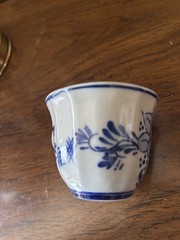 Delft Blue and white demitasse cup and saucer. Hand painted Holland
