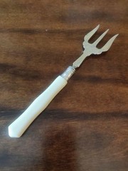 Antique 1913 Edwardian silver collared Trident searing fork