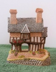 David Winter Cottages Gunsmiths Cottage. In original box.