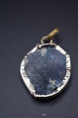 Ancient Roman shard of glass wrapped, 1st-2nd century AD