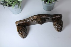 Miniature gothic heads ceramic wall console