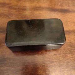 Antique probably Edwardian snuff box with pewter cartouche and decoration