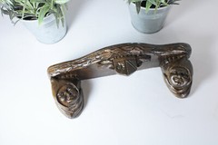 Miniature gothic heads ceramic wall console