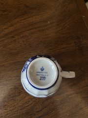 Delft Blue and white demitasse cup and saucer. Hand painted Holland