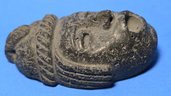 PRE-COLUMBIAN MIXTEC BASALT FACE PENDANT