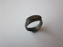 unique ancient Viking engraved relief massive bronze ring with runes.IX – X AD.