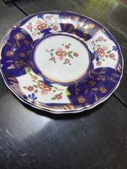 Gaudy Welsh flower plate w copper luster details cobalt blue 8 1/2” D