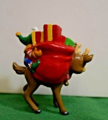 Elf on Rudolph Applause 50th Anniversary Plastic Figurine. Mint in box.