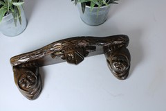 Miniature gothic heads ceramic wall console