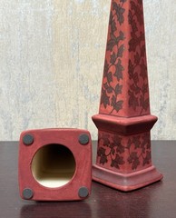 Ceramic Obelisk Pair Matte Finish Foliate Relief Symbol Strength & Protection