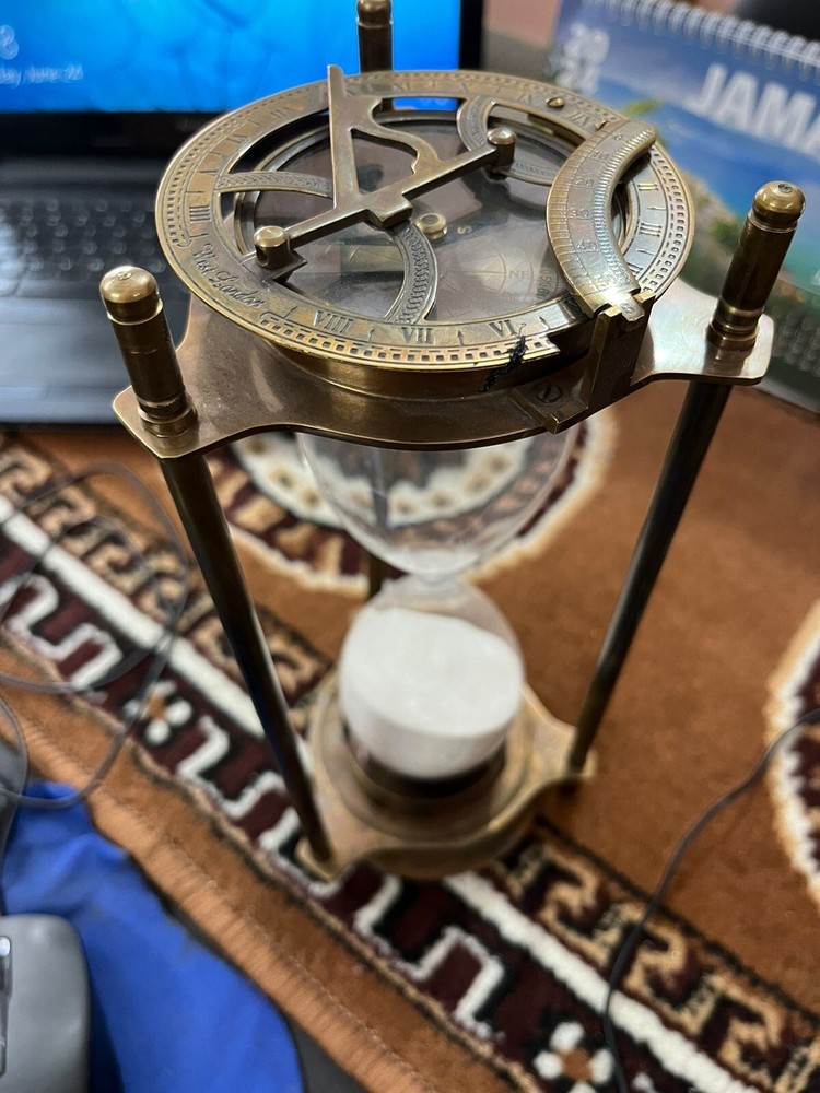 vintage maritime brass sand timer hourglass with sundial compass on top