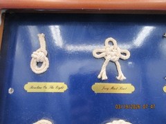 Nautical Wooden Framed Knot Display Featuring Collection of Rope Knots Ship