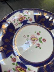 Gaudy Welsh flower plate w copper luster details cobalt blue 8 1/2” D