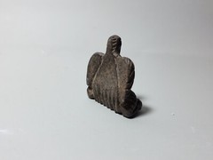 CIRCA NEAR EASTERN BLACK STONE SEATED BIRD.