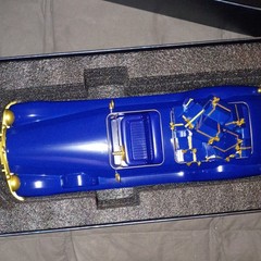 La Prairie Blue Gold Collectible Decorative Model Car Switzerland Plastic
