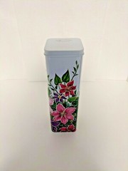 A 9 5/8″ Tall Square Tin with Raised Floral Décor Made in the United Kingdom